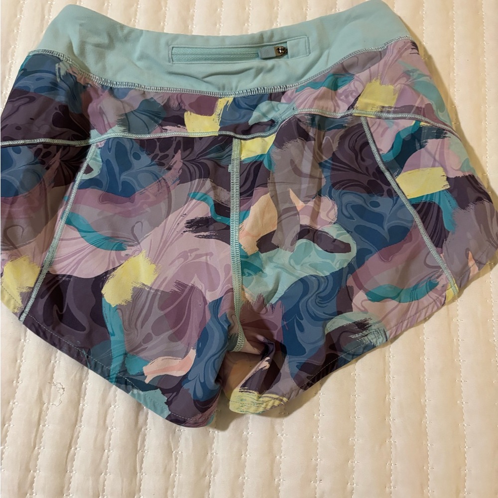 Run The World 3” Short
